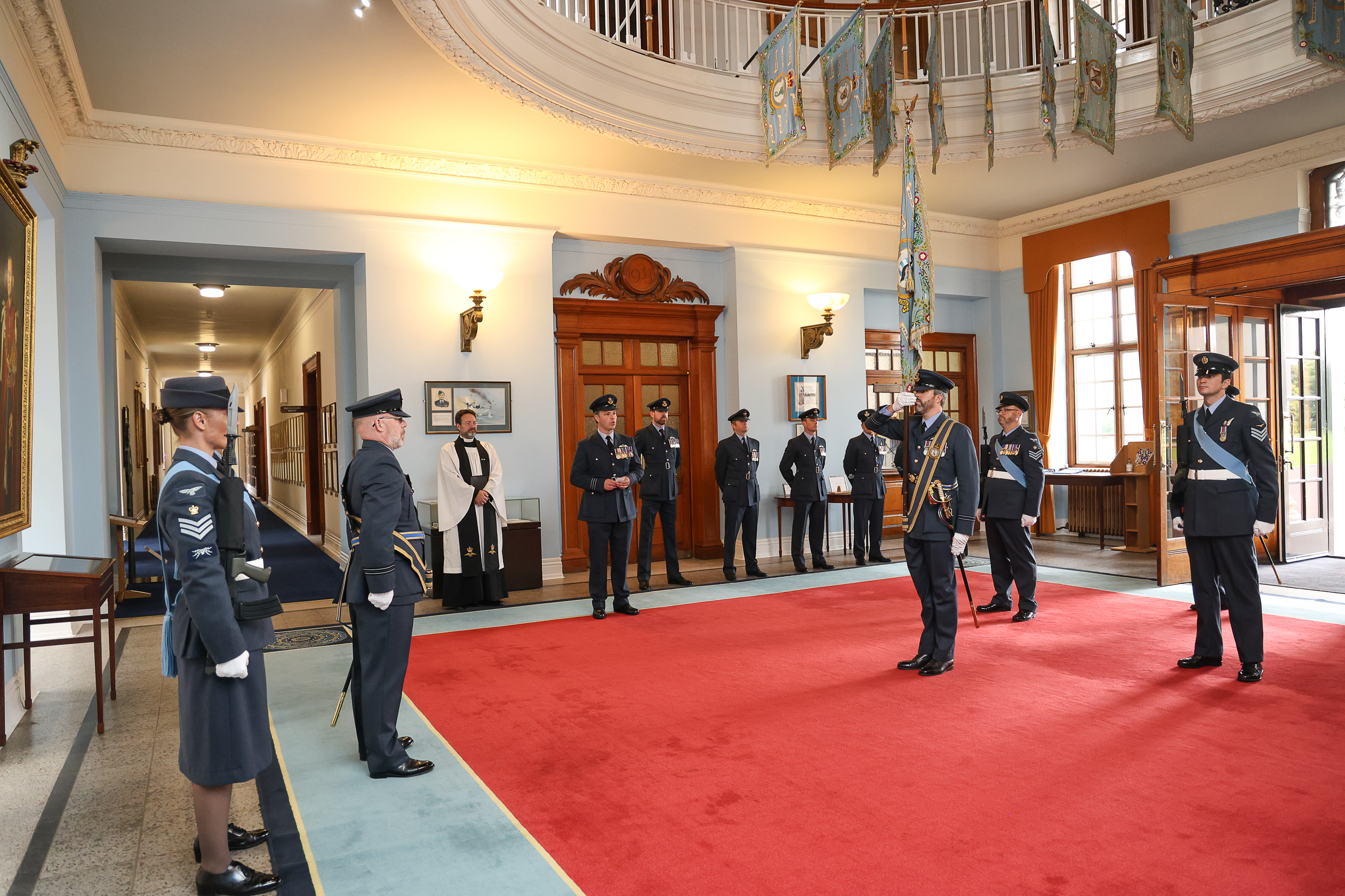 Photo of Number 47 Squadron Standard lodgement in the Rotunda of College Hall Officers’ Mess at RAF College Cranwell.